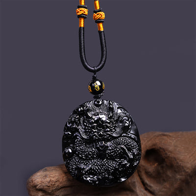 Pendentif collier de protection Foviel en obsidienne noire naturelle sculpté en forme de dragon