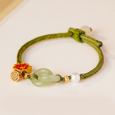 Bracelet porte-bonheur tressé avec boucle de paix en jade de Hetian Foviel motif lotus