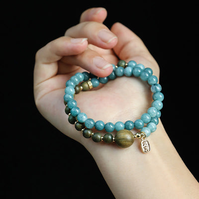 Bracelet double tour Foviel en calcédoine bleue, bois de santal vert et bois de santal rouge à petites feuilles pour l'équilibre émotionnel