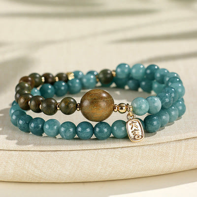 Bracelet double tour Foviel en calcédoine bleue, bois de santal vert et bois de santal rouge à petites feuilles pour l'équilibre émotionnel