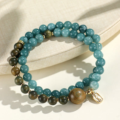 Bracelet double tour Foviel en calcédoine bleue, bois de santal vert et bois de santal rouge à petites feuilles pour l'équilibre émotionnel