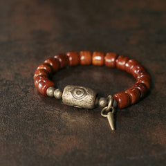 Bracelet de force avec pendentif conique en cuivre en forme de perle Dzi Foviel Bone