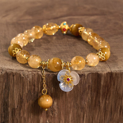 Bracelet fleur à breloque générosité Foviel en citrine et œil de tigre