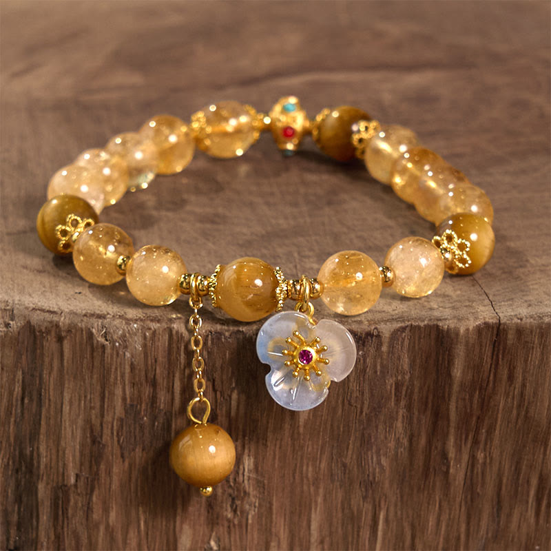 Bracelet fleur à breloque générosité Foviel en citrine et œil de tigre