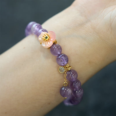Bracelet de méditation porte-bonheur Foviel en améthyste et fleurs de pêcher