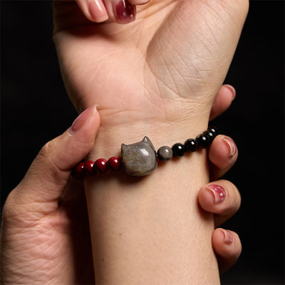Bracelet Foviel en obsidienne noire, cinabre et obsidienne argentée pour la réalisation des vœux