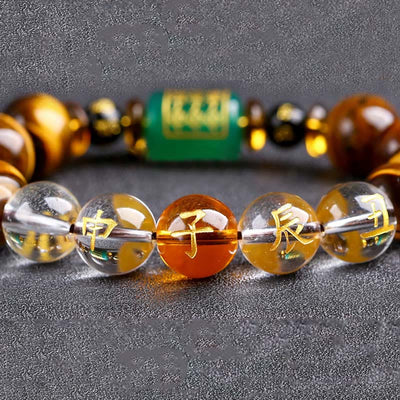 Bracelet de courage Foviel en œil de tigre et cristal blanc du zodiaque chinois