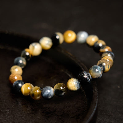 Bracelet de courage en œil de tigre jaune et bleu Foviel