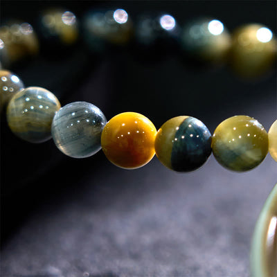Bracelet de courage en œil de tigre jaune et bleu Foviel