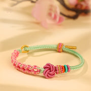 Bracelet tressé fait main Foviel, motif nœud fleur de pêcher rose et vert