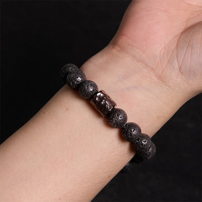 Bracelet de guérison Foviel en roche volcanique, bois d'ébène et œil de tigre
