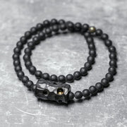 Bracelet de protection Foviel à double tour en onyx noir à surface taillée givrée et bois d'ébène