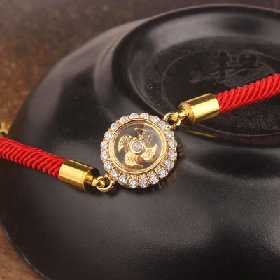 Bracelet tressé de protection Feng Shui à moulinet rotatif en fil rouge, cuivre et laiton Foviel