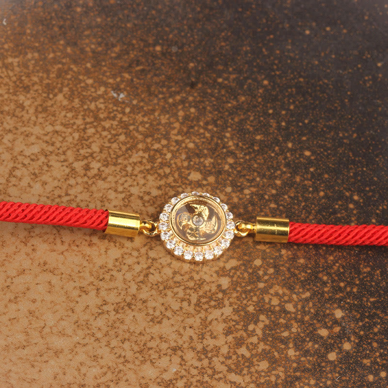 Bracelet tressé de protection Feng Shui à moulinet rotatif en fil rouge, cuivre et laiton Foviel