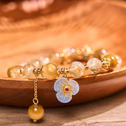Bracelet fleur à breloque générosité Foviel en citrine et œil de tigre