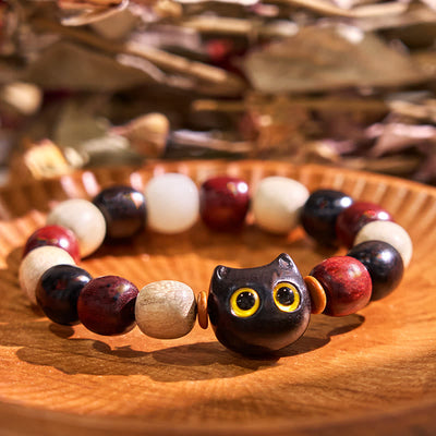 Bracelet de protection Foviel à gravure de chat mignon en bois de santal rouge à petites feuilles et bois d'ébène