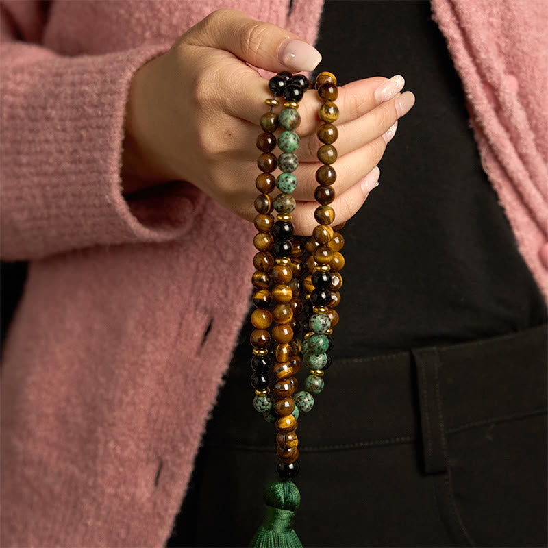 Bracelet Mala 108 perles en pierre naturelle œil de tigre et turquoise avec pompon de protection Foviel