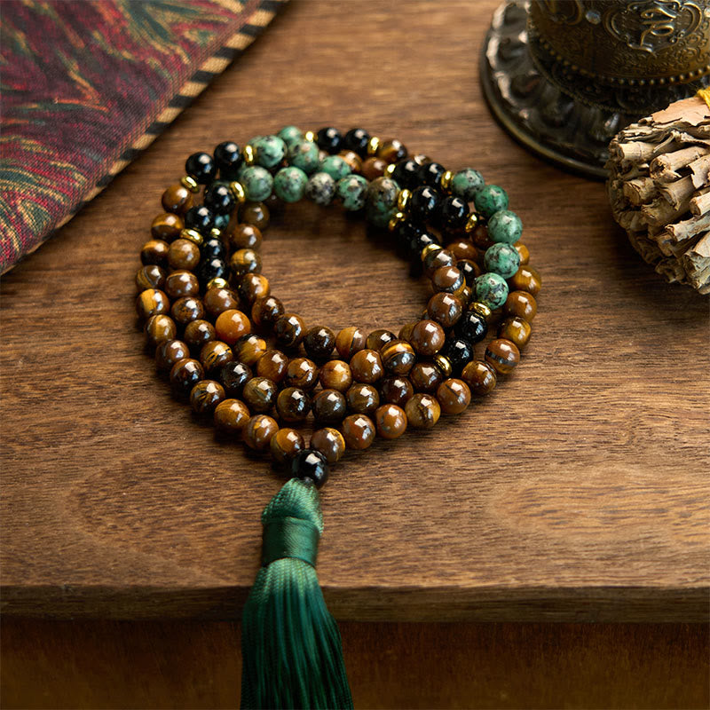 Bracelet Mala 108 perles en pierre naturelle œil de tigre et turquoise avec pompon de protection Foviel