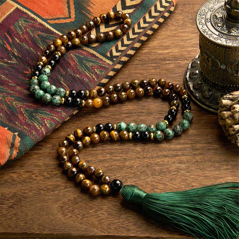 Bracelet Mala 108 perles en pierre naturelle œil de tigre et turquoise avec pompon de protection Foviel