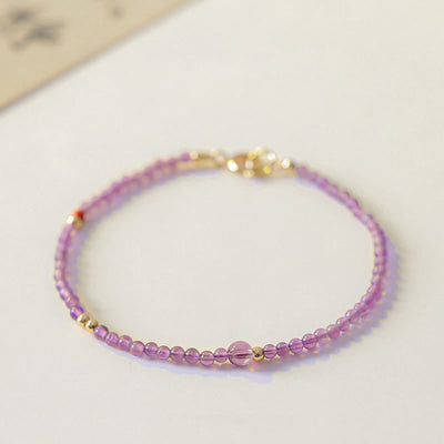 Bracelet de méditation pour la paix intérieure Foviel en perles d'améthyste naturelle ultra-fines de 2 mm et cuivre plaqué or 14 carats