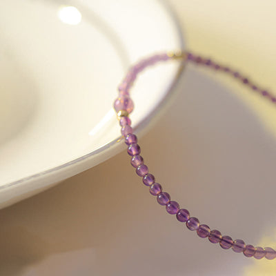 Bracelet de méditation pour la paix intérieure Foviel en perles d'améthyste naturelle ultra-fines de 2 mm et cuivre plaqué or 14 carats