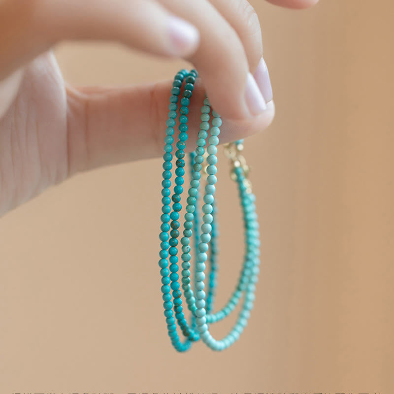 Bracelet de sagesse Foviel en perles turquoise ultra-fines de 2 mm en cuivre plaqué or 14 carats