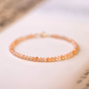 Bracelet de richesse Foviel en perles ultra-fines de pierre de soleil de 3 mm, plaqué or 14 carats sur cuivre