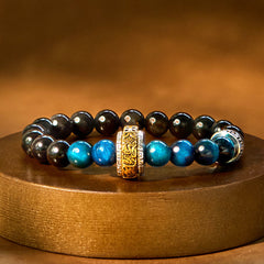 Bracelet de protection Foviel en obsidienne argentée, œil de tigre bleu et mantra Om Mani Padme Hum