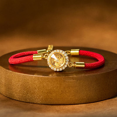 Bracelet tressé de protection Feng Shui à moulinet rotatif en fil rouge, cuivre et laiton Foviel