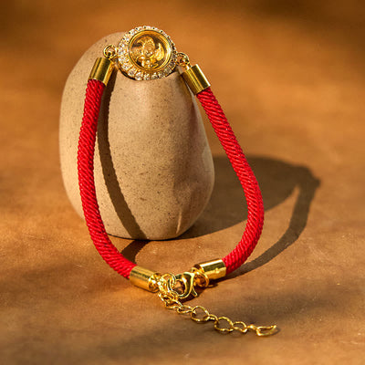 Bracelet tressé de protection Feng Shui à moulinet rotatif en fil rouge, cuivre et laiton Foviel