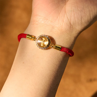 Bracelet tressé de protection Feng Shui à moulinet rotatif en fil rouge, cuivre et laiton Foviel