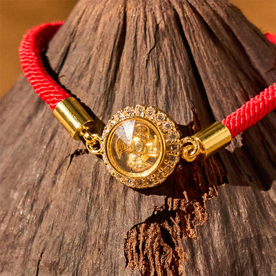 Bracelet tressé de protection Feng Shui à moulinet rotatif en fil rouge, cuivre et laiton Foviel