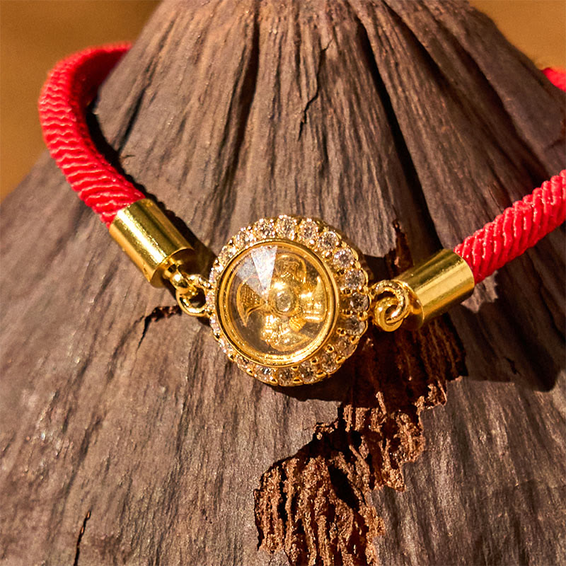 Bracelet tressé de protection Feng Shui à moulinet rotatif en fil rouge, cuivre et laiton Foviel