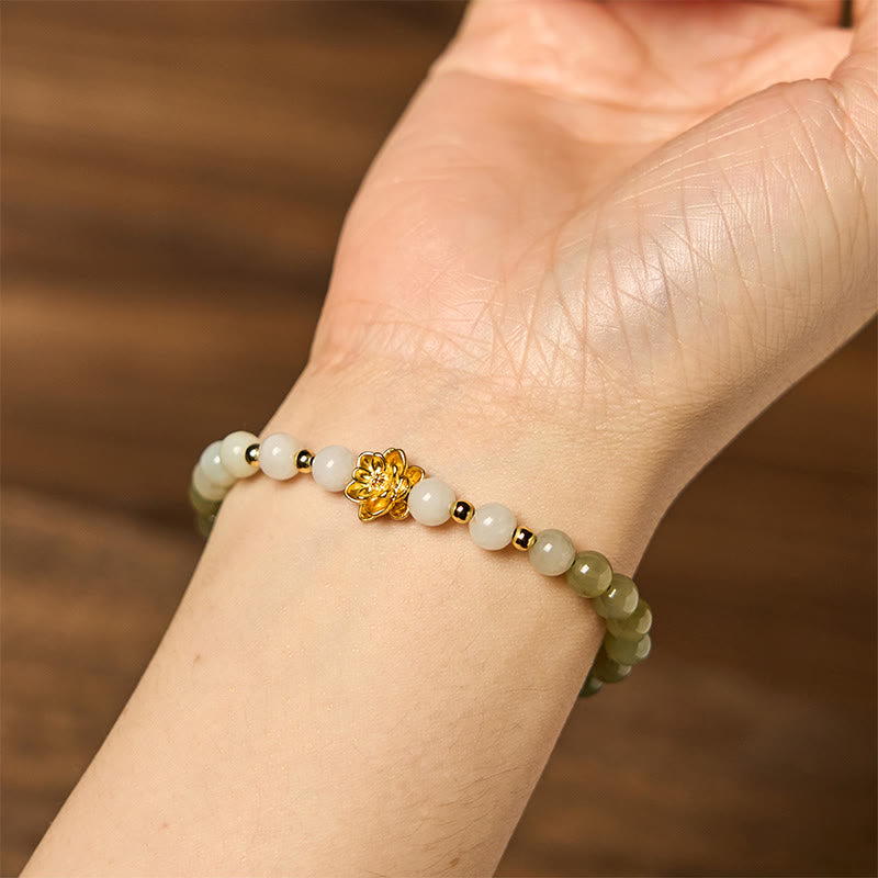 Bracelet Abondance Foviel en jade de Khotan naturel dégradé motif lotus
