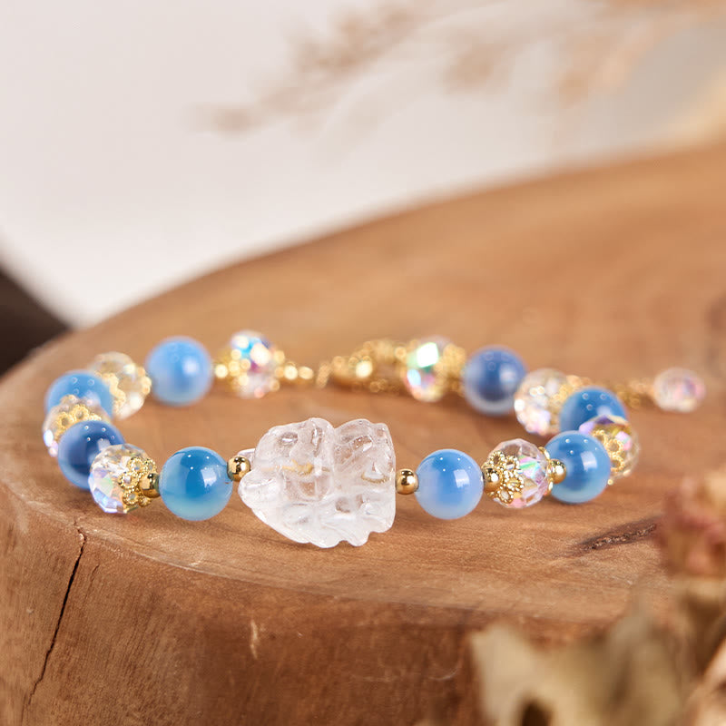 Bracelet harmonie Foviel en agate bleue naturelle, cristal blanc et motif renard à neuf queues