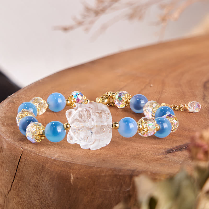 Bracelet harmonie Foviel en agate bleue naturelle, cristal blanc et motif renard à neuf queues