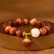 Bracelet apaisant Foviel en pierre œil-de-tigre rouge naturelle en forme de citrouille