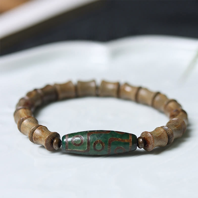 Bracelet de paix Foviel en bois de santal vert avec perle Dzi tibétaine à neuf yeux