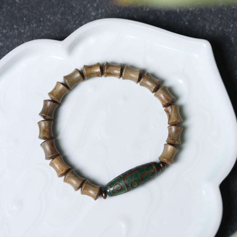 Bracelet de paix Foviel en bois de santal vert avec perle Dzi tibétaine à neuf yeux