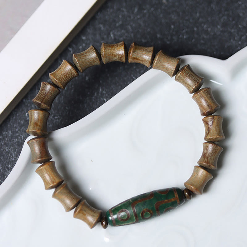 Bracelet de paix Foviel en bois de santal vert avec perle Dzi tibétaine à neuf yeux