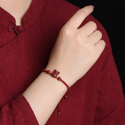 Bracelet porte-bonheur Foviel fait main en cinabre avec lapin du zodiaque chinois et cordon rouge