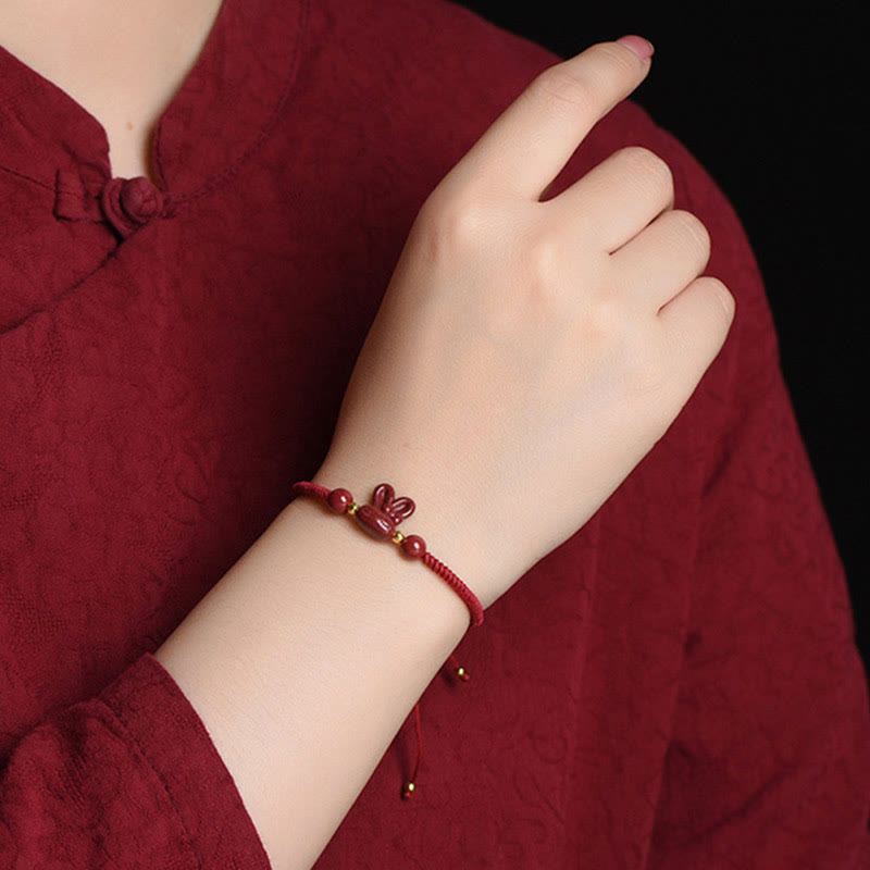 Bracelet porte-bonheur Foviel fait main en cinabre avec lapin du zodiaque chinois et cordon rouge