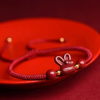 Bracelet porte-bonheur Foviel fait main en cinabre avec lapin du zodiaque chinois et cordon rouge