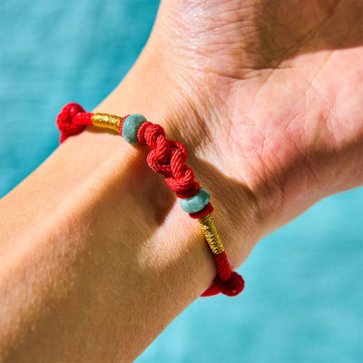 Bracelet couple tressé Foviel à nœud chinois en jade et fil rouge porte-bonheur