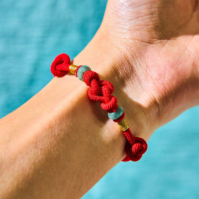 Bracelet couple tressé Foviel à nœud chinois en jade et fil rouge porte-bonheur