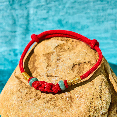 Bracelet couple tressé Foviel à nœud chinois en jade et fil rouge porte-bonheur
