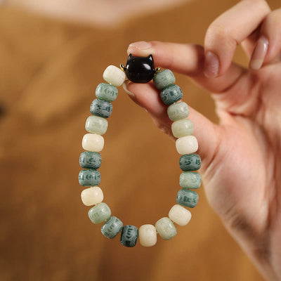 Bracelet de sagesse Foviel en obsidienne argentée sculptée en forme de tête de chat avec graine de Bodhi et mantra Om Mani Padme Hum
