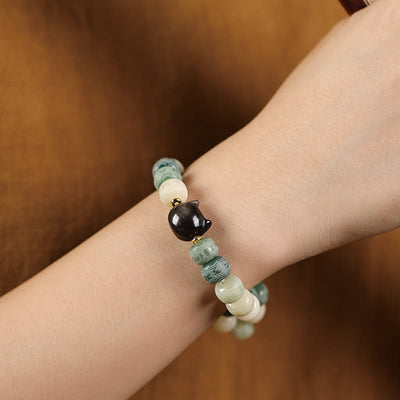 Bracelet de sagesse Foviel en obsidienne argentée sculptée en forme de tête de chat avec graine de Bodhi et mantra Om Mani Padme Hum