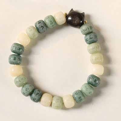 Bracelet de sagesse Foviel en obsidienne argentée sculptée en forme de tête de chat avec graine de Bodhi et mantra Om Mani Padme Hum