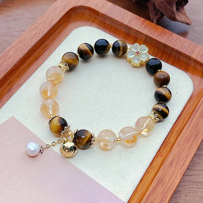 Bracelet Foviel à perles de fleur et clochette en œil de tigre naturel et citrine pour le courage